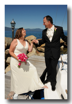 Bride and groom on the boat pier