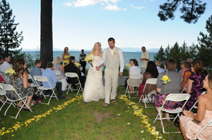 The bride and groom walk the aisle during the processional