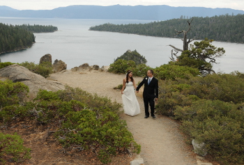 Couple holding hands at Emerald Bay