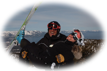 Groom holding bride on skis