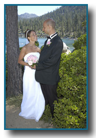 Bride and groom holding the bouquet