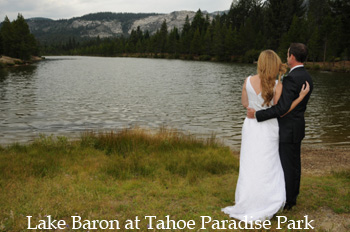 Newlyweds look out at Lake Baron at Paradise Park