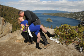 The groom dips his bride