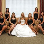 On the couch with all of her bridesmaids