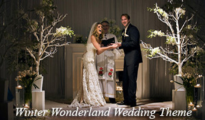 The bride and groom have fun during their winter wonderland themed ceremony