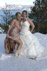 Bride with her bridesmaid in the snow