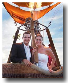 Bride and groom launch their balloon