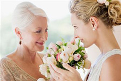 Mother of bride gazes lovingly at her daughter