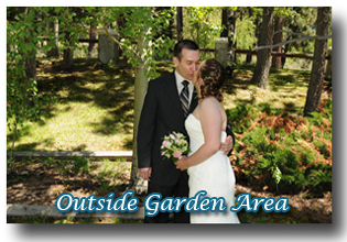 Married couple embrace in the garden area