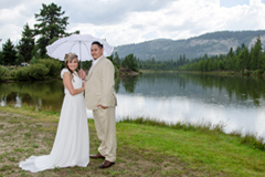 Married couple with Lake Baron in the background