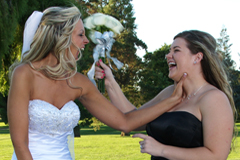 Playful bride and bridesmaid