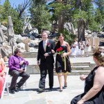 The flower girls follow the maid of honor and best man down the aisle