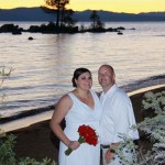 Newlyweds pause for a sunset photo at Zephyr Cove