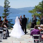 Wedding is in progress at the edge of the veranda